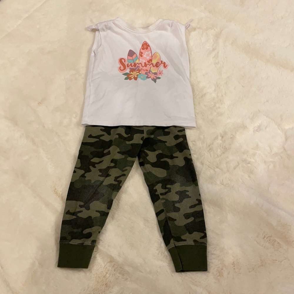 Army fatigue pants and white ‘summer fun’ top